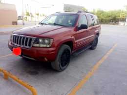 GRAND CHEROKEE LIMITED 2004 $40,000MIL A TRATAR 